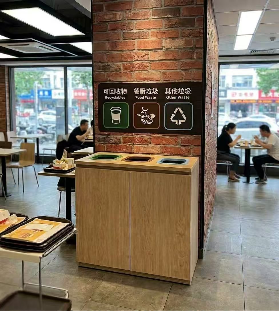 JENTON waste bin installed in a modern dining environment